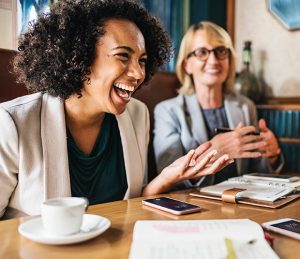 Two women having fun at work