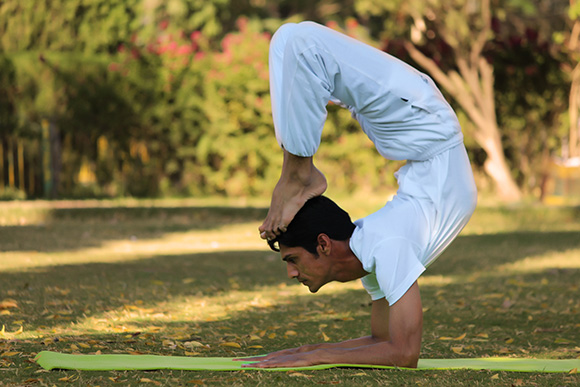 man doing yoga stretch