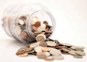 Tipped Over Jar of Coins