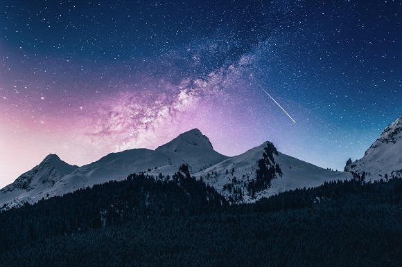 Snow Capped Mountain Range With Falling Star