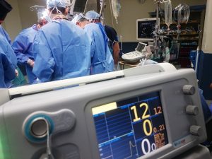 surgery room with doctors and nurses