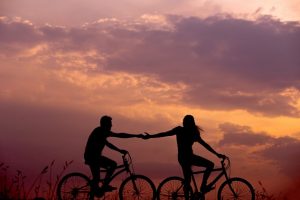 Bikers holding hands