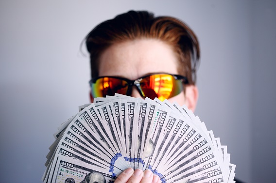 Guy Holding Cash With Sunglasses
