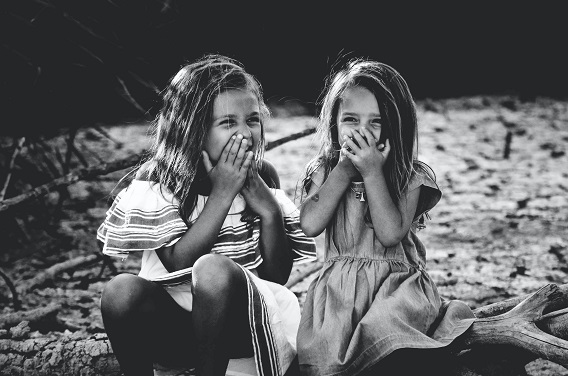 Two Little Girls Laughing